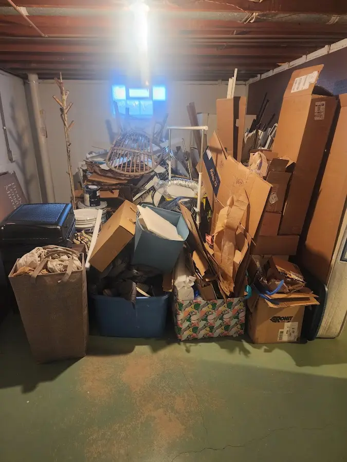 Roll-off dumpster container at job site for 40 Yard Dumpster Rental in Malden